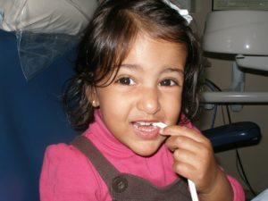 Girl at the dentist office