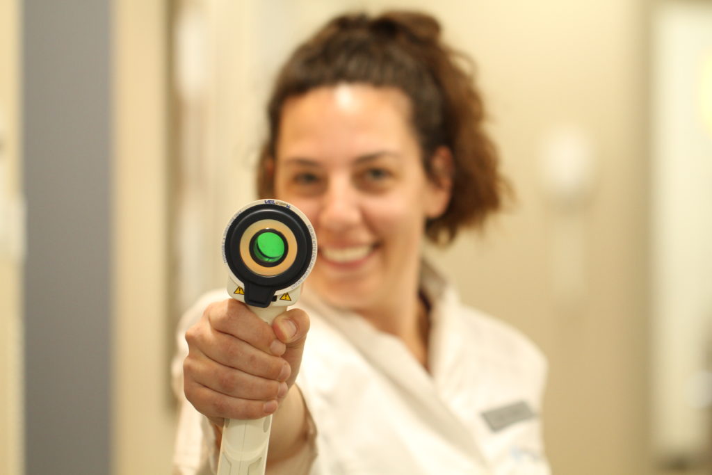 Lady using VELscope.