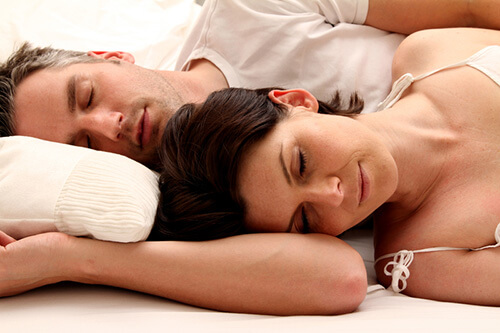 couple sleeping in bed