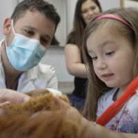 little girl and dentist